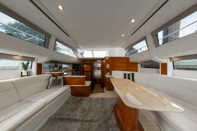  Yacht Photos Pics Luxurious interior of 2007 Meridian 459 Motoryacht with elegant seating and dining area.