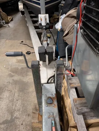  Yacht Photos Pics Boat trailer with winch system for 2010 Mainship Pilot 31 in a storage area.