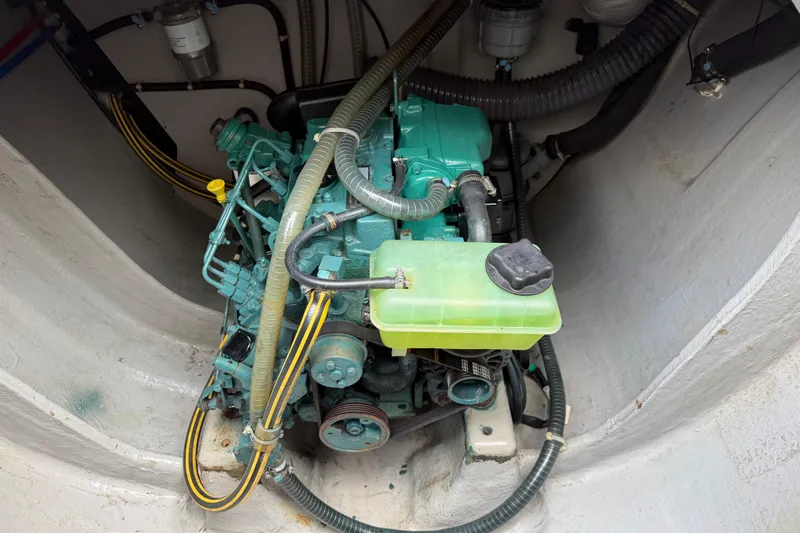 Muse Yacht Photos Pics Engine compartment of a 2019 Nautitech 40 Open catamaran, showcasing mechanical components.