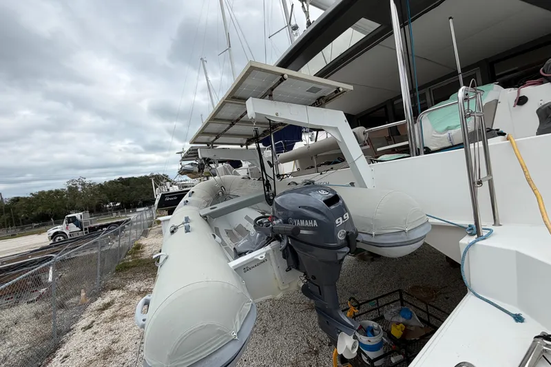 Muse Yacht Photos Pics 2019 Nautitech 40 Open catamaran with Yamaha outboard motor and dinghy on deck.