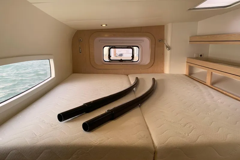 Spekeend Yacht Photos Pics Interior cabin of 2021 Outremer 51 catamaran with twin beds and ocean view.