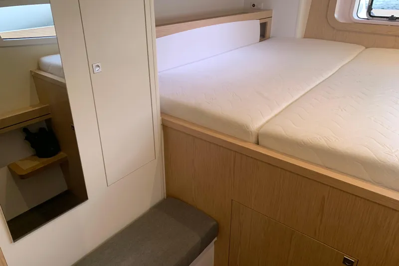 Spekeend Yacht Photos Pics Interior cabin of 2021 Outremer 51 yacht with bed and storage.