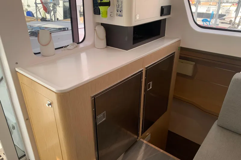 Spekeend Yacht Photos Pics Interior of 2021 Outremer 51 yacht, featuring modern cabinetry and sleek design elements.