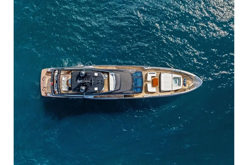 Euro Yacht Photos Pics Aerial view of 2024 Riva 130' Bellissima yacht on blue ocean water.