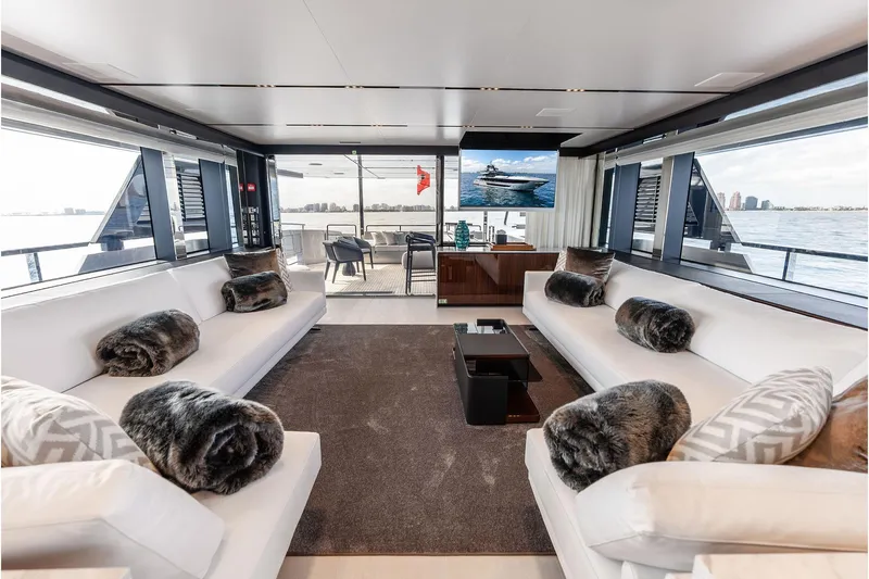 Euro Yacht Photos Pics Luxurious interior of 2024 Riva 130' Bellissima yacht with elegant seating and panoramic views.