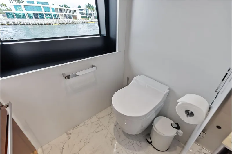 Euro Yacht Photos Pics Luxurious bathroom on 2024 Riva 130' Bellissima yacht with waterfront view.