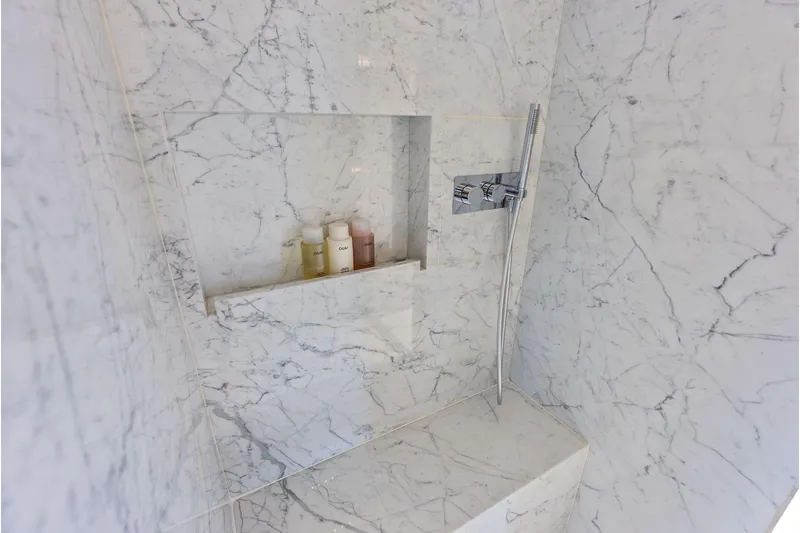 Euro Yacht Photos Pics Luxurious marble shower in 2024 Riva 130' Bellissima yacht bathroom.