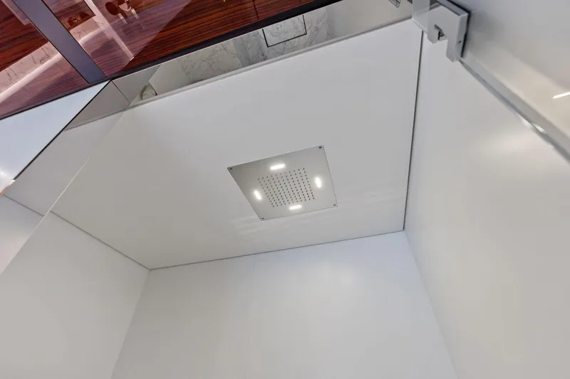 Euro Yacht Photos Pics Modern shower ceiling with recessed lighting on 2024 Riva 130' Bellissima yacht.