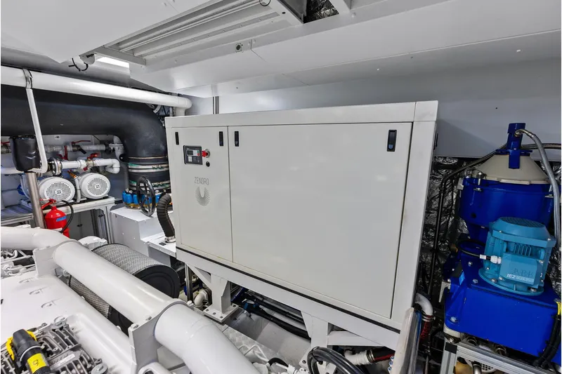 Euro Yacht Photos Pics Engine room of 2024 Riva 130' Bellissima yacht, featuring advanced machinery and equipment.
