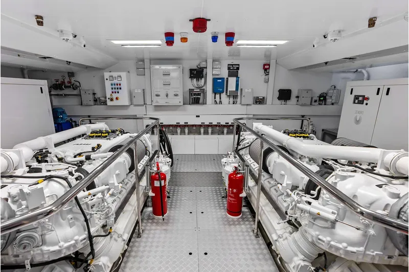 Euro Yacht Photos Pics Engine room of 2024 Riva 130' Bellissima yacht, featuring advanced machinery and safety equipment.