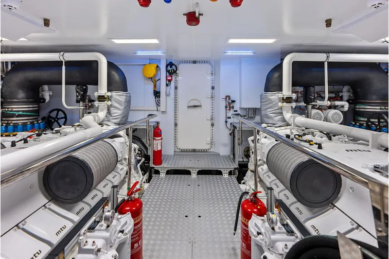 Euro Yacht Photos Pics Engine room of 2024 Riva 130' Bellissima yacht, featuring advanced machinery and safety equipment.