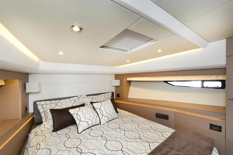  Yacht Photos Pics Luxurious bedroom interior of 2018 Prestige 560 Fly yacht with modern design and cozy bedding.