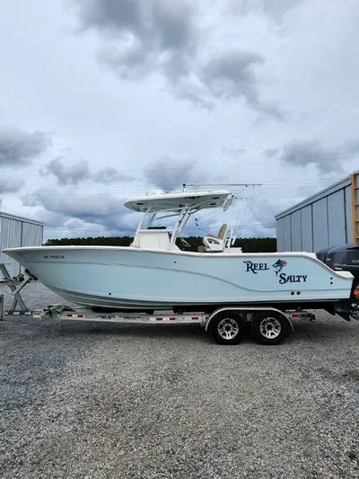 Reel Salty Yacht Photos Pics 2015 Sea Fox 286 Commander boat on a trailer, side view.