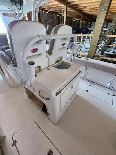 Reel Salty Yacht Photos Pics 2015 Sea Fox 286 Commander boat interior with dual seats and storage.