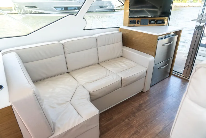 Duke Yacht Photos Pics Luxurious interior of 2018 Cruisers Yachts 50 Cantius with leather seating and modern amenities.