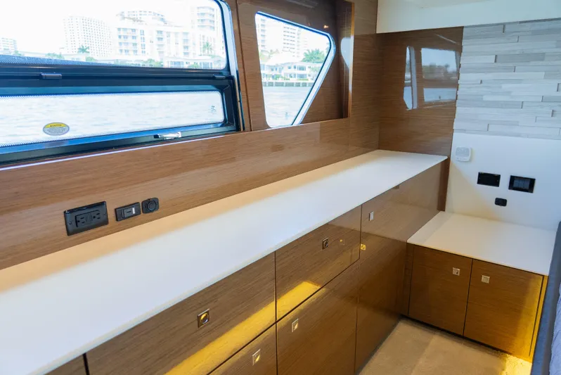 Duke Yacht Photos Pics 2018 Cruisers Yachts 50 Cantius interior with sleek wood cabinetry and modern design.