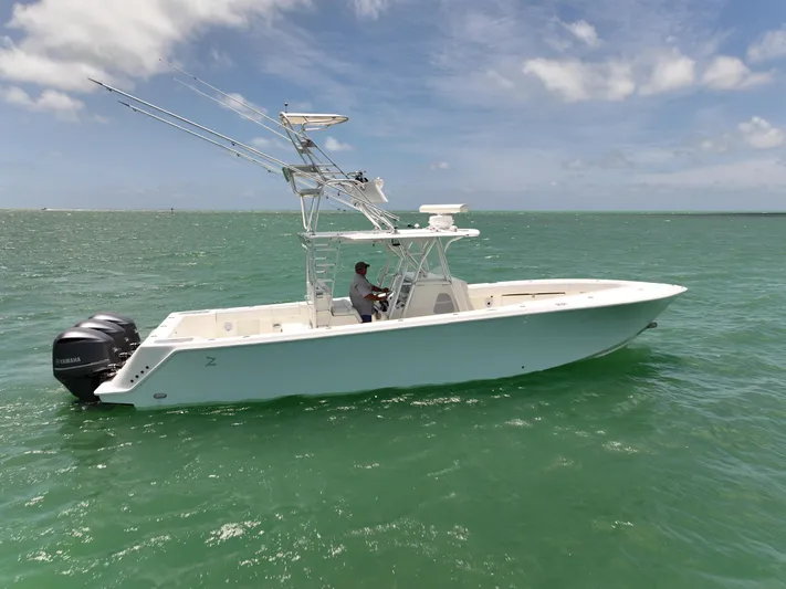 Yacht Photos Pics 2015 SeaVee 370z boat on open water with clear skies.
