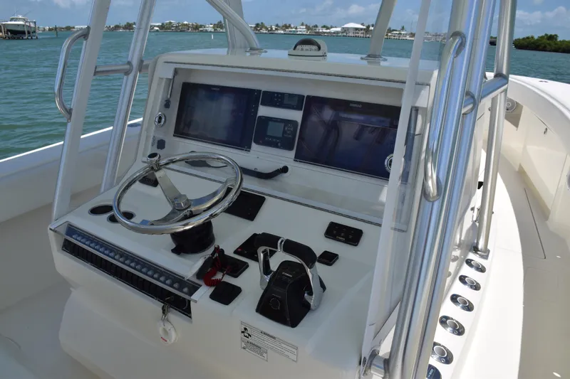  Yacht Photos Pics 2015 SeaVee 370z boat console with dual screens and steering wheel.