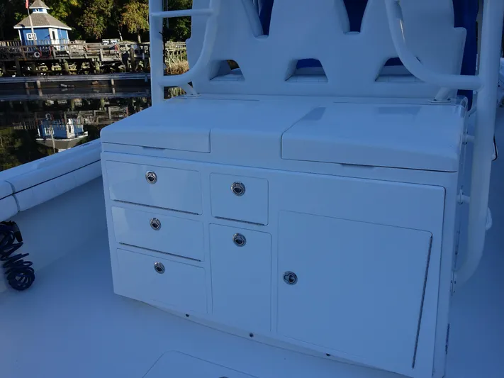  Yacht Photos Pics 2016 Regulator 41 boat with white storage cabinets on deck.