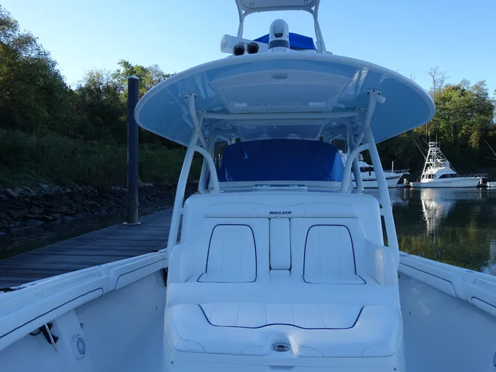  Yacht Photos Pics 2016 Regulator 41 boat docked, featuring spacious seating and sleek design.