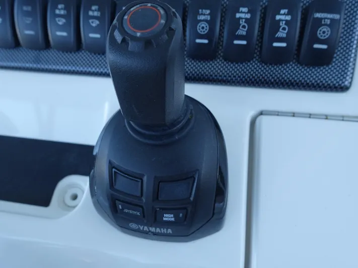  Yacht Photos Pics Yamaha joystick control on 2016 Regulator 41 boat dashboard.
