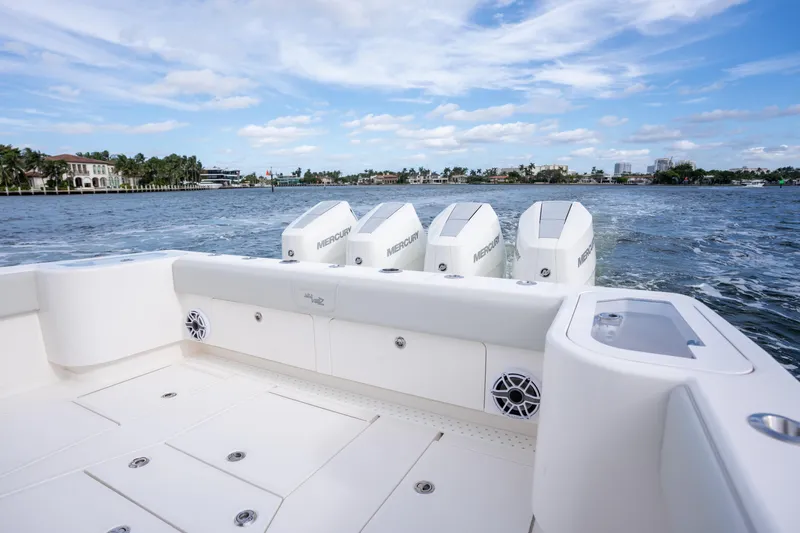  Yacht Photos Pics 2026 SeaVee 420Z boat with Mercury engines on a scenic waterway.