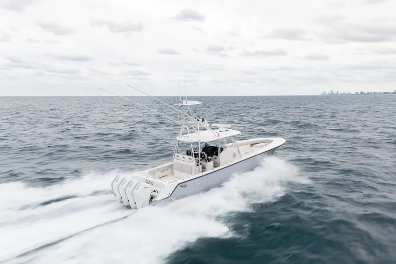  Yacht Photos Pics 2026 SeaVee 420Z boat cruising on open ocean waters.