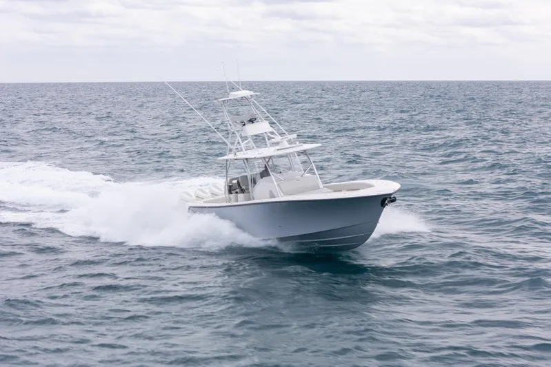  Yacht Photos Pics 2026 SeaVee 420Z boat cruising on open ocean waters.