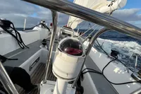 Sailing on a 1992 Devonport Challenge 67 yacht, navigating through ocean waves.