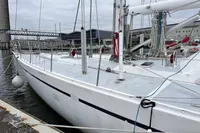 Sailboat Devonport Challenge 67, 1992 model, docked in a marina.