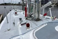 Deck view of 1992 Devonport Challenge 67 yacht with ropes and winches in a marina.