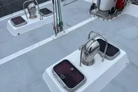 Deck view of 1992 Devonport Challenge 67 yacht with hatches and winches.