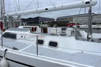 Sailing yacht Devonport Challenge 67, 1992 model, docked at a marina.