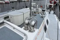 Deck view of 1992 Devonport Challenge 67 yacht docked at a marina.