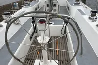 Cockpit of 1992 Devonport Challenge 67 yacht with steering wheel and nautical equipment.