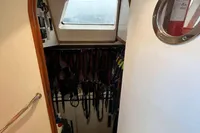 Interior view of 1992 Devonport Challenge 67 yacht with wooden doorway and nautical equipment.