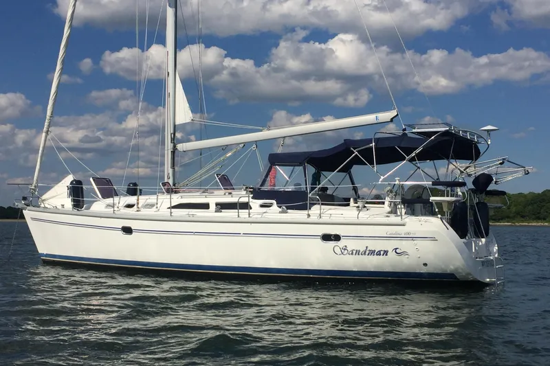 Sandman Yacht Photos Pics Sailboat Catalina 400 MkII 2004 on water under blue sky.