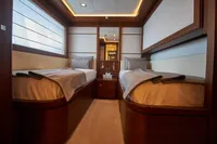 Luxurious twin cabin interior on 2010 Custom Line Navetta 33 yacht.