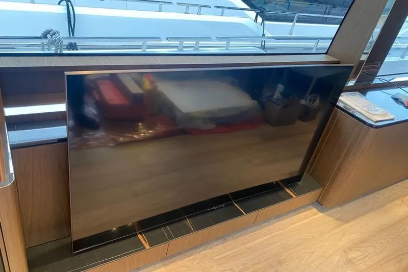  Yacht Photos Pics Luxury interior of 2023 Ferretti Yachts 780 with sleek, modern TV setup.