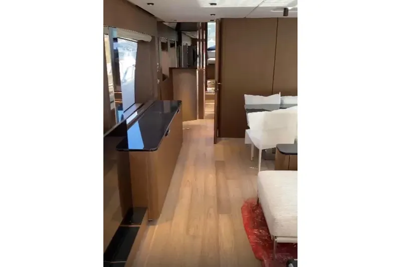  Yacht Photos Pics Luxurious interior of 2023 Ferretti Yachts 780, featuring elegant wood finishes and modern design.