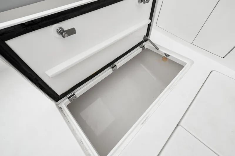  Yacht Photos Pics Open storage compartment on 2019 Intrepid 410 Evolution boat deck.