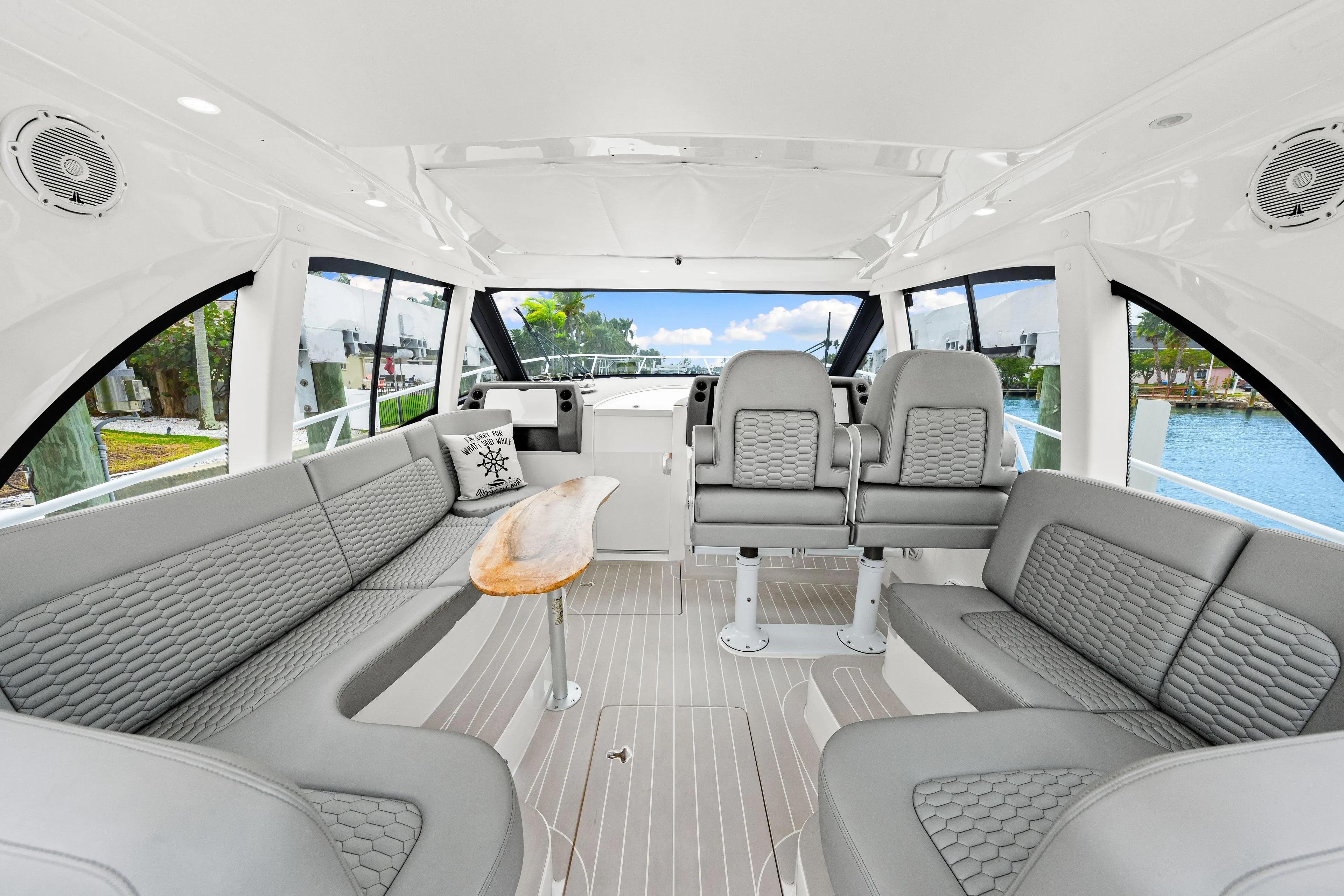  Yacht Photos Pics Luxurious interior of 2019 Intrepid 410 Evolution yacht with elegant seating and modern design.