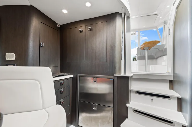  Yacht Photos Pics Interior of 2019 Intrepid 410 Evolution yacht with modern design and sleek cabinetry.