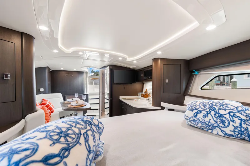  Yacht Photos Pics Luxurious interior of 2019 Intrepid 410 Evolution yacht with modern design and elegant furnishings.