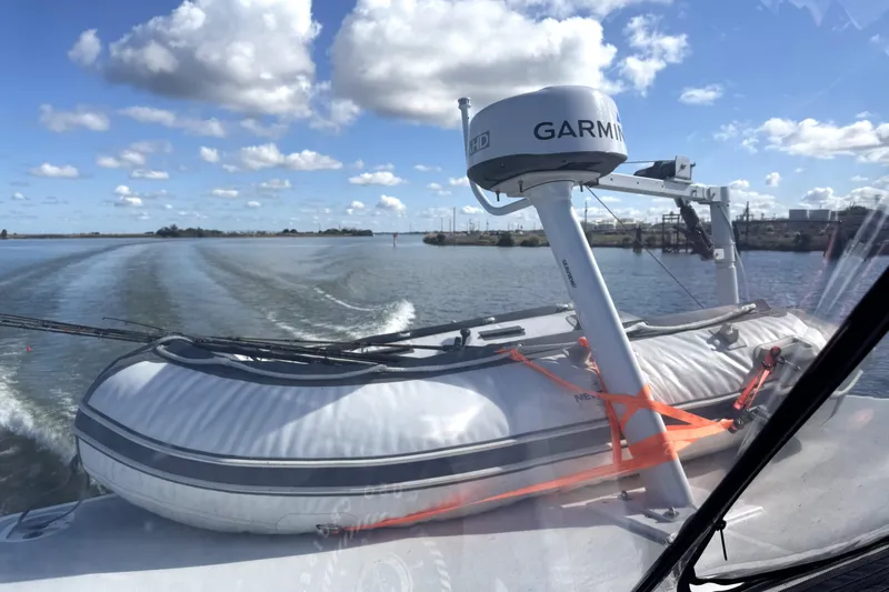 Ananda Yacht Photos Pics 1999 Silverton 422 Motor Yacht with Garmin radar and inflatable boat on deck.