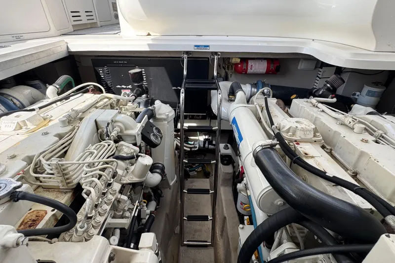  Yacht Photos Pics Engine room of 2003 Sea Ray 420 Sundancer with visible machinery and equipment.