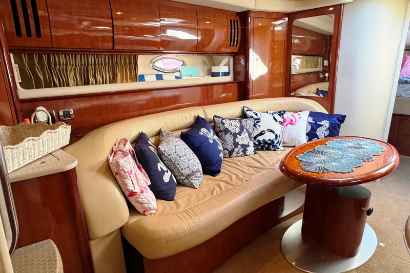  Yacht Photos Pics Luxurious 2003 Sea Ray 420 Sundancer interior with plush seating and decorative pillows.