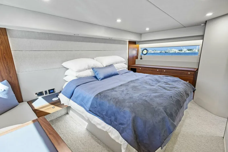 Barbara Sue III Yacht Photos Pics Luxurious bedroom interior of 2025 Maritimo M55 yacht with ocean view.