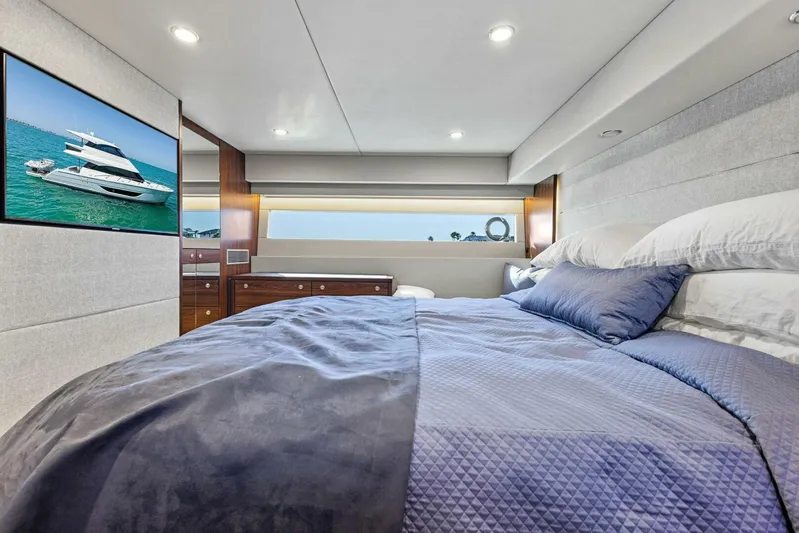 Barbara Sue III Yacht Photos Pics Luxurious bedroom interior of 2025 Maritimo M55 yacht with modern decor and ocean view.