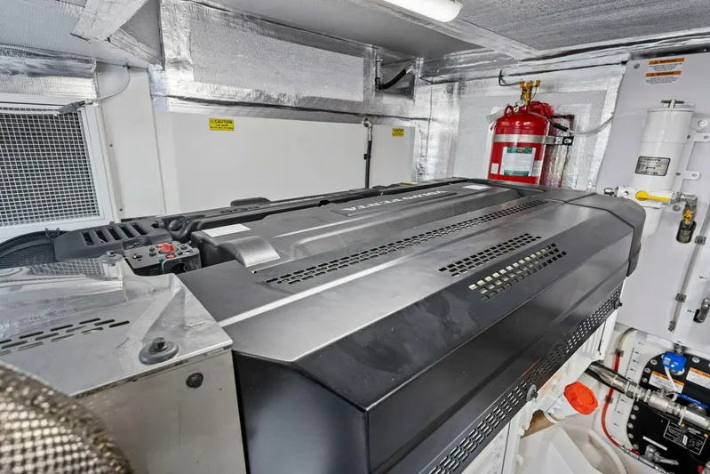 Barbara Sue III Yacht Photos Pics Engine room of 2025 Maritimo M55 yacht, featuring advanced machinery and safety equipment.